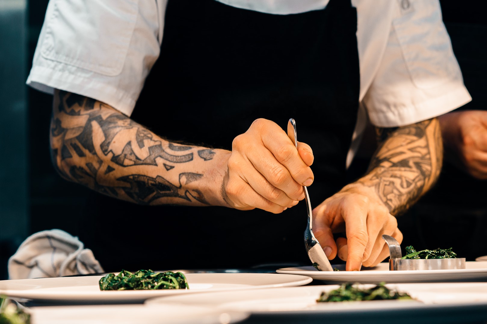 Michelin Star Restaurants in the Algarve 2025. The chef prepares various dishes to serve at the Michelin-starred restaurant.